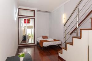 a small room with a bed and a window at B28 - Stylish Typical House in Lagos