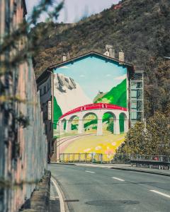 a large billboard on the side of a road at Garni Pola in Brusio