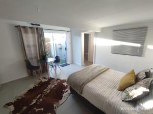 Una cama o camas en una habitación de Linkside lodge