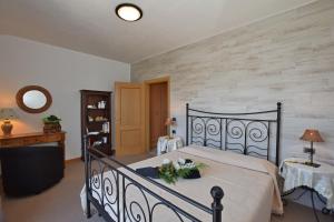 Postel nebo postele na pokoji v ubytování Margherita