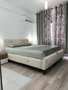 Una cama o camas en una habitación de Jagodina J&M apartman