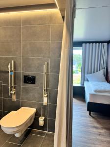 Koupelna v ubytování KEH Hotel by WMM Hotels