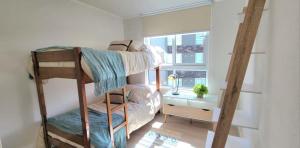 En eller flere senge i et værelse på Rbk° Depto nuevo en condominio en Papudo + 14 billeder