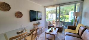 Et tv og/eller underholdning på Rbk° Depto nuevo en condominio en Papudo