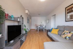 Μια τηλεόραση ή/και κέντρο ψυχαγωγίας στο Brisas del mar eddy, air, wifi