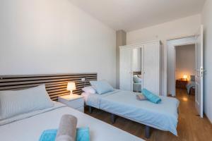 Ένα ή περισσότερα κρεβάτια σε δωμάτιο στο Brisas del mar eddy, air, wifi +18 φωτογραφίες