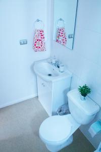 Et badeværelse på Departamentos Arrayán