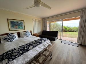 Ένα ή περισσότερα κρεβάτια σε δωμάτιο στο Seaside on Southend +43 φωτογραφίες