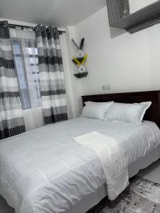 Krevet ili kreveti u jedinici u okviru objekta Lavish Apartment