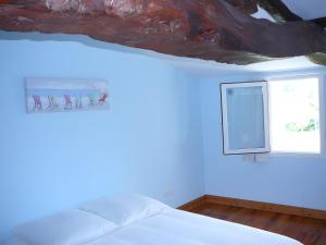 Postel nebo postele na pokoji v ubytování Gite Les Hauts De L'estuaire