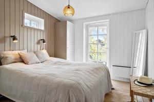 Ένα ή περισσότερα κρεβάτια σε δωμάτιο στο 30108-Odder-Rosenvej-4