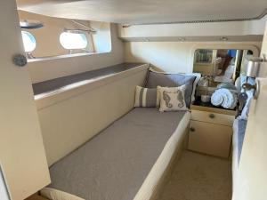 a small bed in the back of an rv at punta excursiones the king of kings in Punta Cana