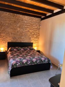 Ένα ή περισσότερα κρεβάτια σε δωμάτιο στο Vigna Di Pettineo +49 φωτογραφίες