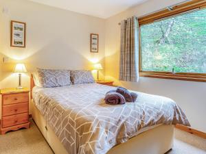 Postel nebo postele na pokoji v ubytování Balnagowan Mill