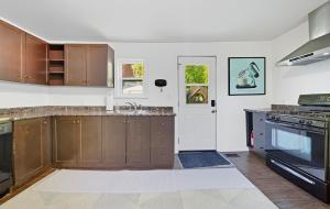 Kuchyň nebo kuchyňský kout v ubytování Cumberland Cottage