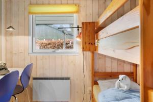a small room with a bunk bed and a window at 30193-Odder-Thorasvej-79 in Odder