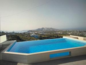 Hồ bơi trong/gần Blue Domes Escape - Stylish Santorini Stay
