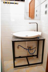 Koupelna v ubytování The Moon Apartments + 25 fotografií