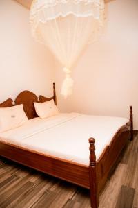 Postel nebo postele na pokoji v ubytování The Moon Apartments