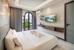 Ένα ή περισσότερα κρεβάτια σε δωμάτιο στο Villa NovaWorld Phan Thiết - 86Home - Biệt thự 4 phòng ngủ - No13334