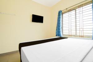 TV a/nebo společenská místnost v ubytování Hotel O Unicorn Guest House