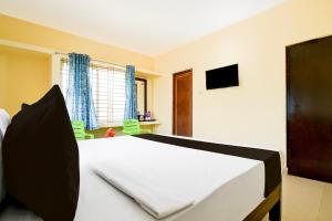 TV a/nebo společenská místnost v ubytování Hotel O Unicorn Guest House