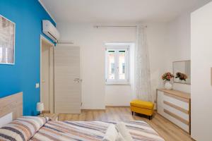 Ένα ή περισσότερα κρεβάτια σε δωμάτιο στο Claudia's Home Minimal Design 500m from the Center