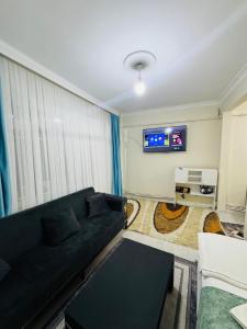 TV a/nebo společenská místnost v ubytování Sultanahmet yacht Hotel + 68 fotografií