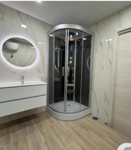 a bathroom with a shower and a sink and a mirror at B&B antonia in SantʼAntonio Abate