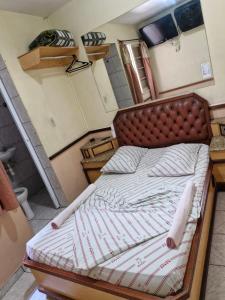 Ένα ή περισσότερα κρεβάτια σε δωμάτιο στο Hotel Puma Chalé