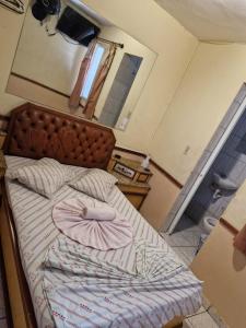 Ένα ή περισσότερα κρεβάτια σε δωμάτιο στο Hotel Puma Chalé