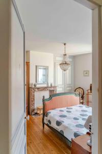 Ένα ή περισσότερα κρεβάτια σε δωμάτιο στο Chez Marie