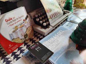 a table with some food items on it at La casa del patio in Ágreda