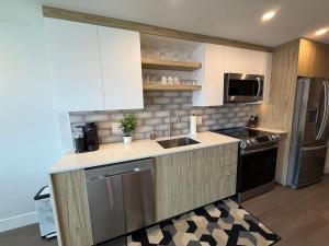 Kuchyň nebo kuchyňský kout v ubytování Bright spotless and modern 1 BR with gym + 13 fotografií