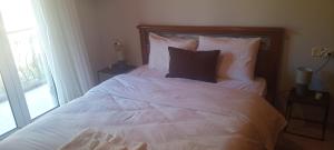 Postel nebo postele na pokoji v ubytování House by the Mountain + 4 fotografie