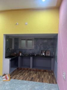 Η κουζίνα ή μικρή κουζίνα στο Mysore villa