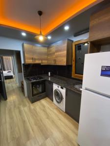 Η κουζίνα ή μικρή κουζίνα στο Rezidance Hotel