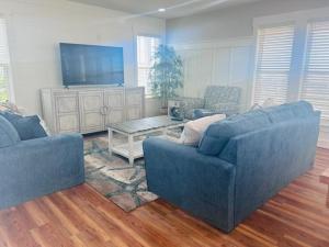 TV a/nebo společenská místnost v ubytování Somewhere South home