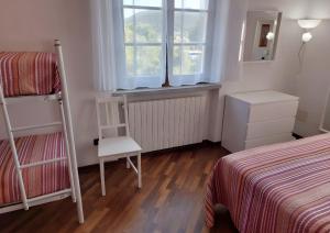 Postel nebo postele na pokoji v ubytování L'Appartamentino Di Giulia