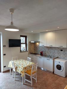 Kuchyň nebo kuchyňský kout v ubytování L'Appartamentino Di Giulia