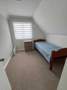 Postel nebo postele na pokoji v ubytování Casa Parque Fundadores