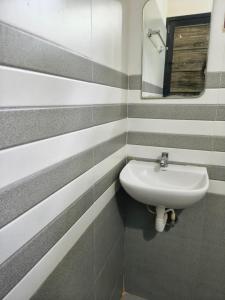 Koupelna v ubytování Poppy Stays Varkala