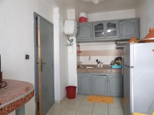 Kuchyň nebo kuchyňský kout v ubytování Ghazoua 1