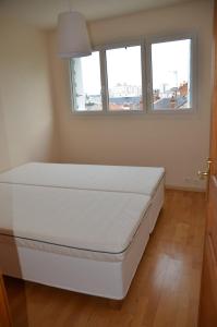 Postel nebo postele na pokoji v ubytování HYPER CENTRE TOURS avec Parking