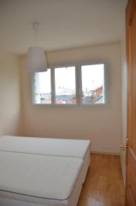 Postel nebo postele na pokoji v ubytování HYPER CENTRE TOURS avec Parking