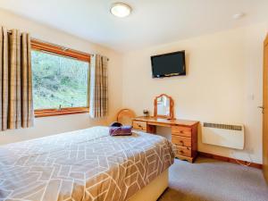 Postel nebo postele na pokoji v ubytování Balnagowan Mill