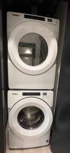 a washing machine and a washer and dryer at Penthouse downtown 1 Bedroom with 6 appliances in Halifax