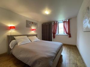 Una cama o camas en una habitación de Choko-ona