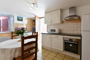 Una cocina o cocineta en Choko-ona