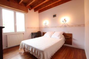 Ένα ή περισσότερα κρεβάτια σε δωμάτιο στο Ongui ethorri